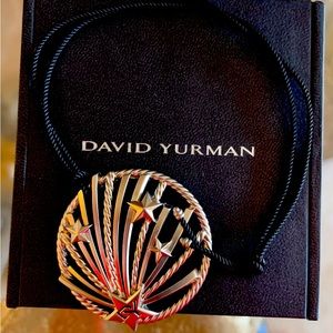 David Yurman piece on black knotted chord marked 2021